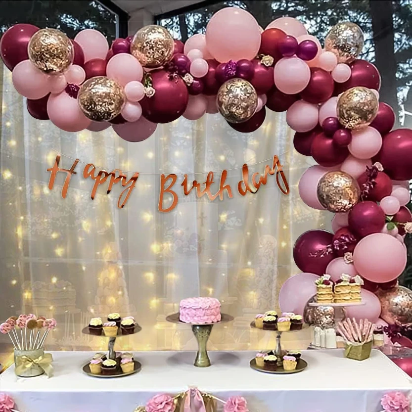 Elegant Celebration: Red and gold balloons with floral accents create a sophisticated backdrop for special moments.