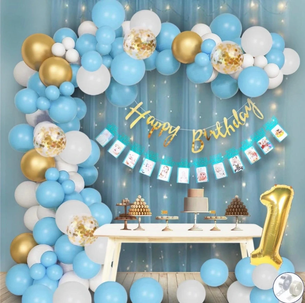 🎈 Dreamy Pastel Birthday Arch  Description: Soft blue, silver aur golden shades ke balloons ke saath banaya gaya yeh arch photo sessions ke liye perfect hai. Simple, clean aur bahut hi charming birthday decoration.
